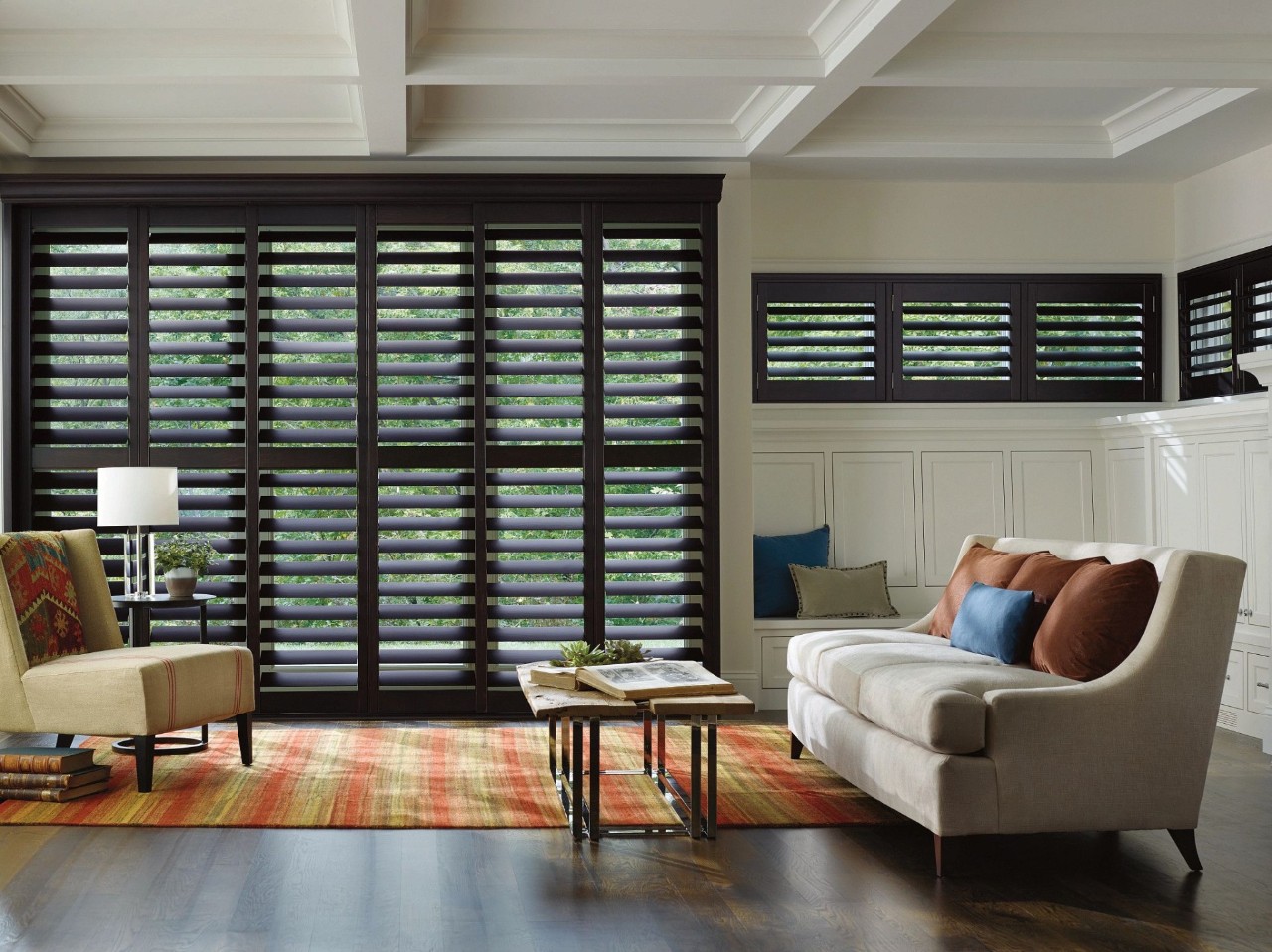 Hunter Douglas Heritance® Wood Shutters hanging in a living room window